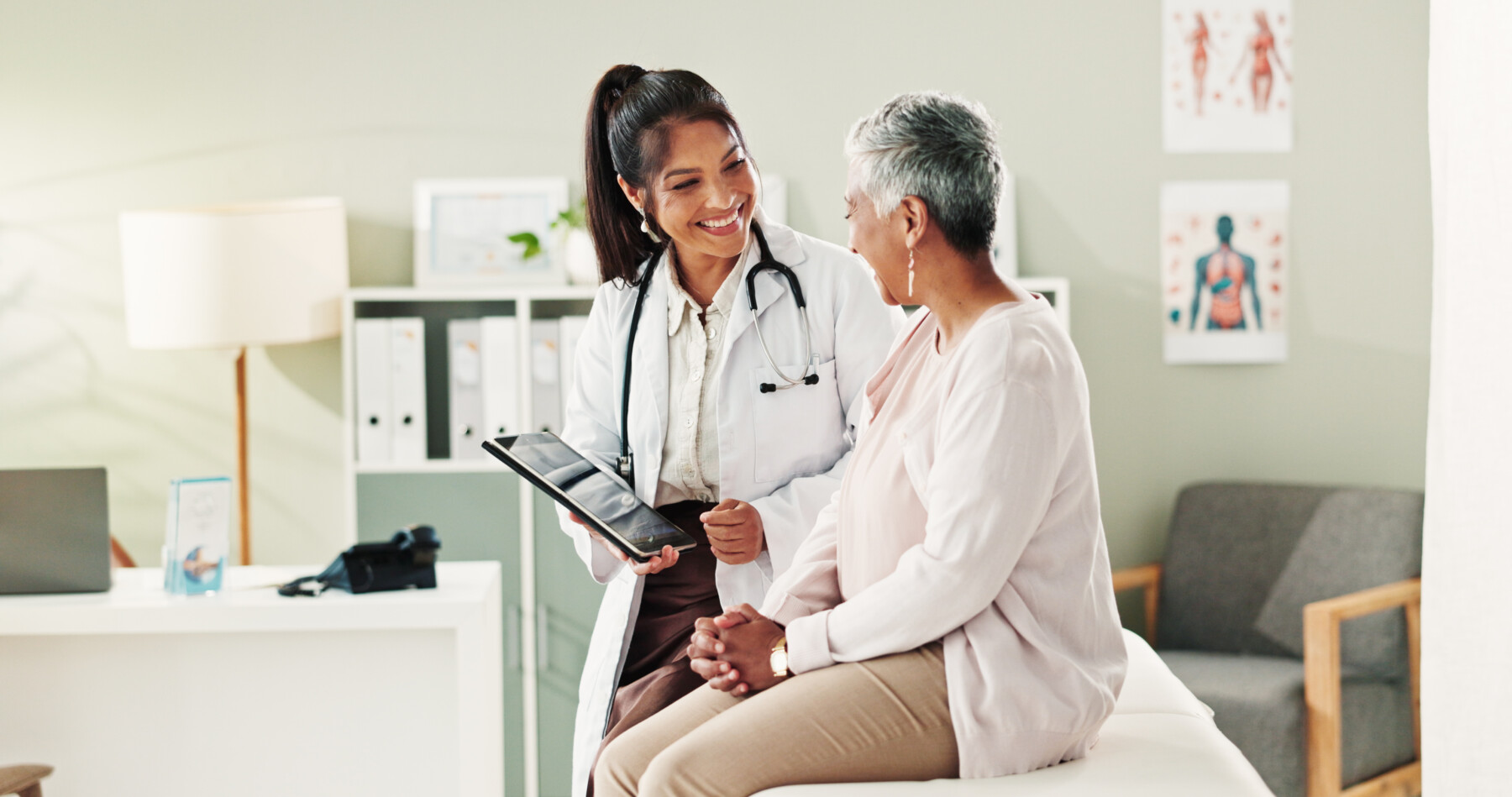 An image of a female doctor speaking with a patient.